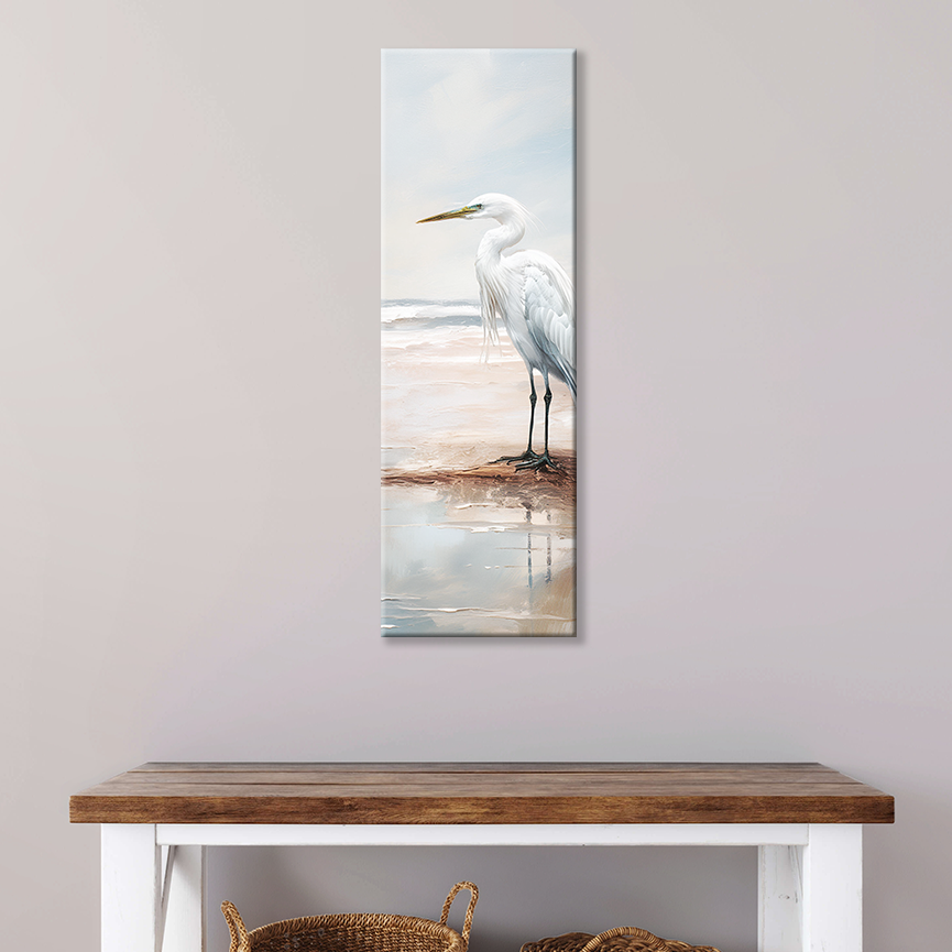 This heron bird painting hanging on a wall – premium thick coastal canvas.
