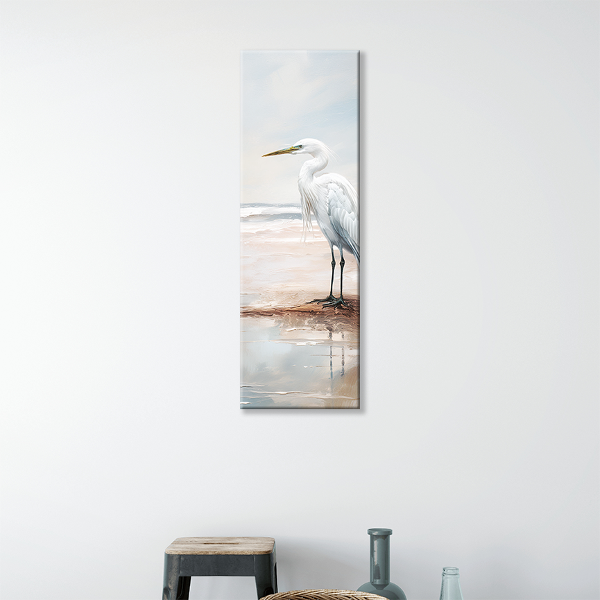 This egret art hanging on a wall, perfect for a beach-inspired space