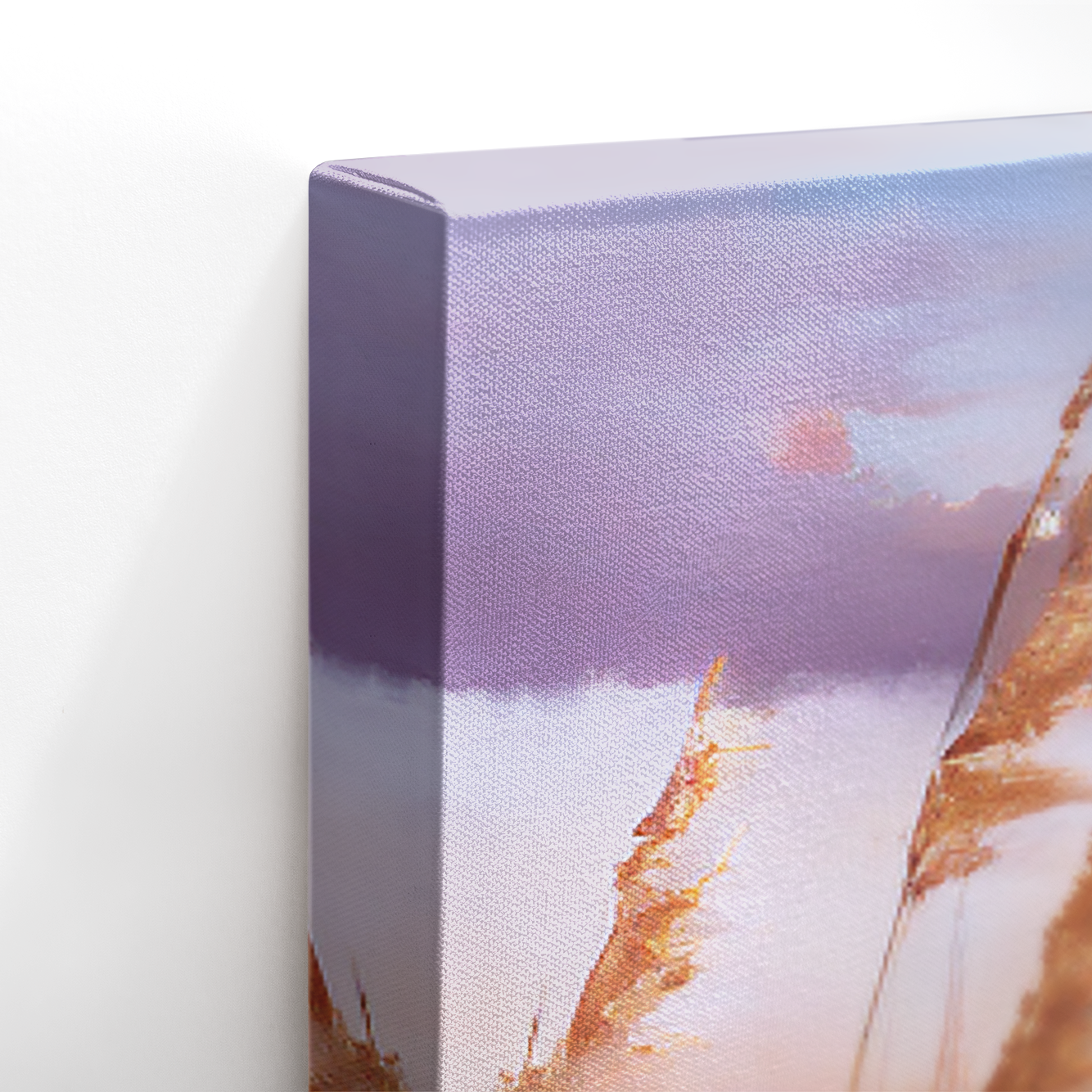 Close-up of gallery-wrapped edge showing beach wall art on canvas with fade-resistant texture