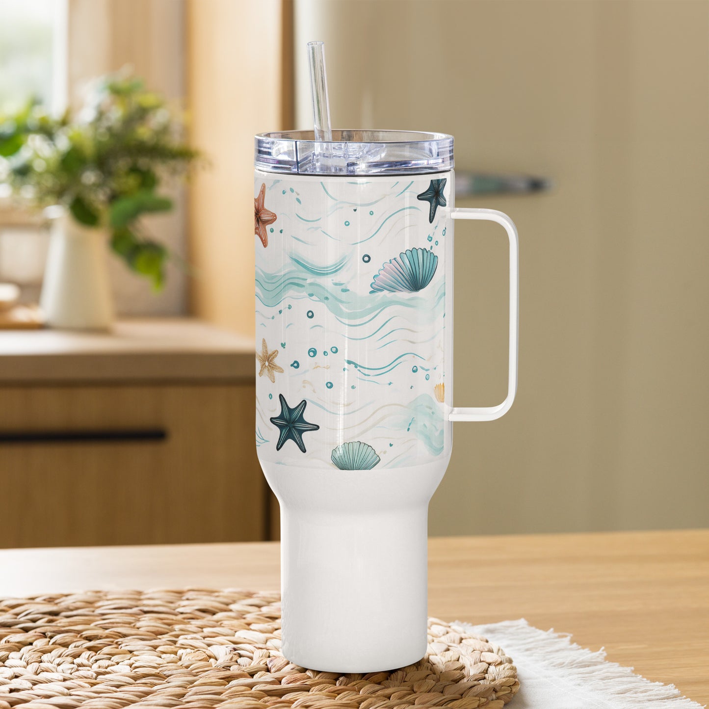 Front view of the travel mug on kitchen counter, a 40 oz coffee tumbler with handle—sleek, beach-inspired, and built like the best travel coffee mug.