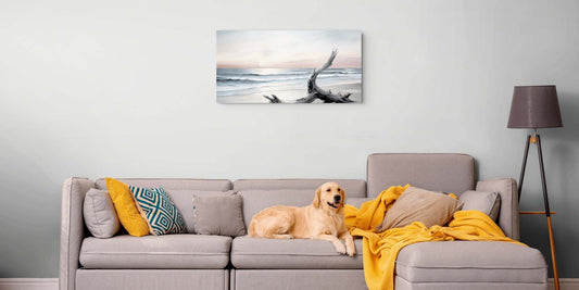 Over the sofa wall decor canvas hanging above a sofa with a dog resting on it