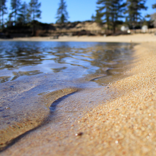 small waves rolling up onto the sand