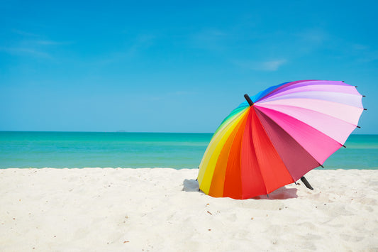 Umbrella in the sand with a view of the ocean