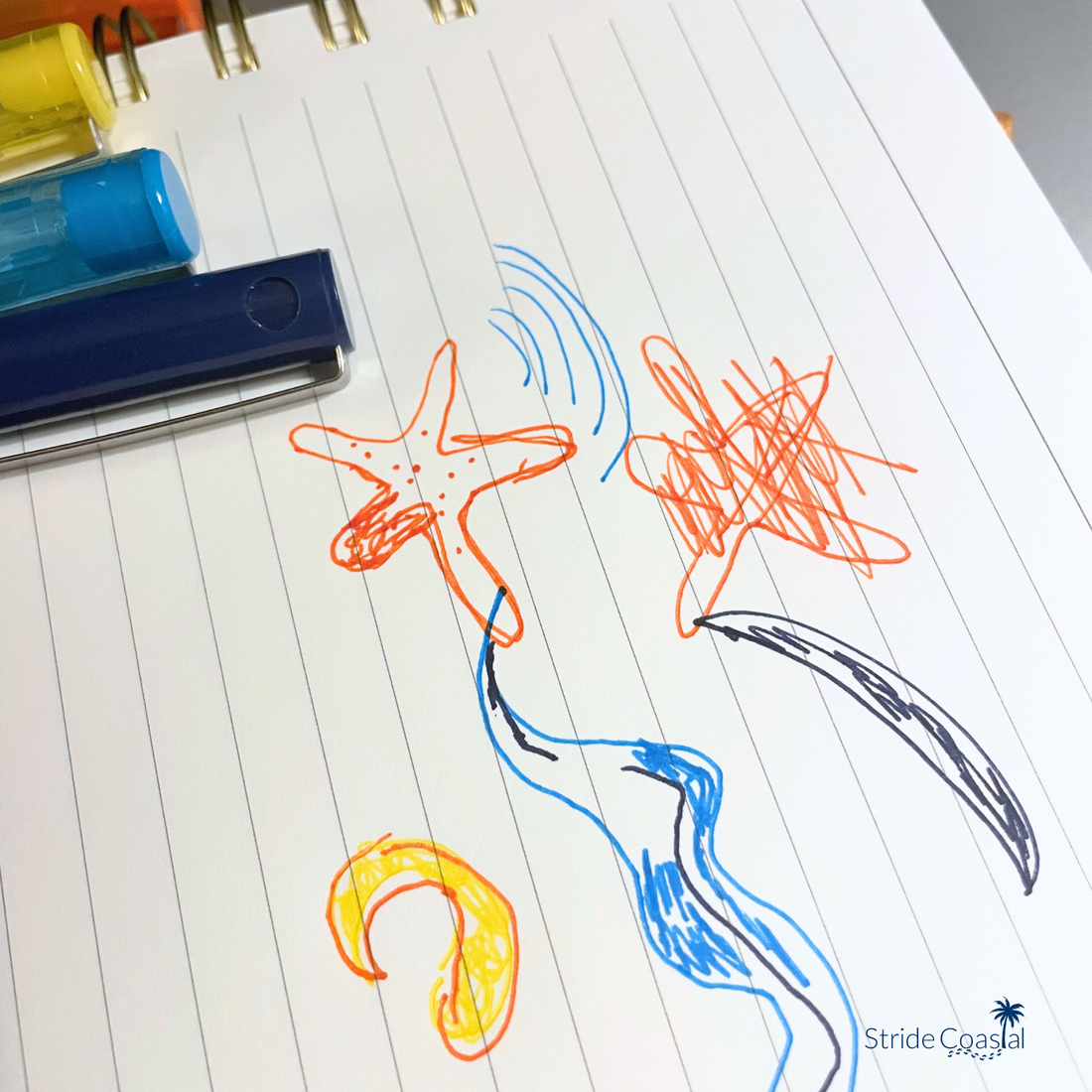 multi colored doodles on lined paper of the curvy waves design that's on a tumbler, mug, and tote