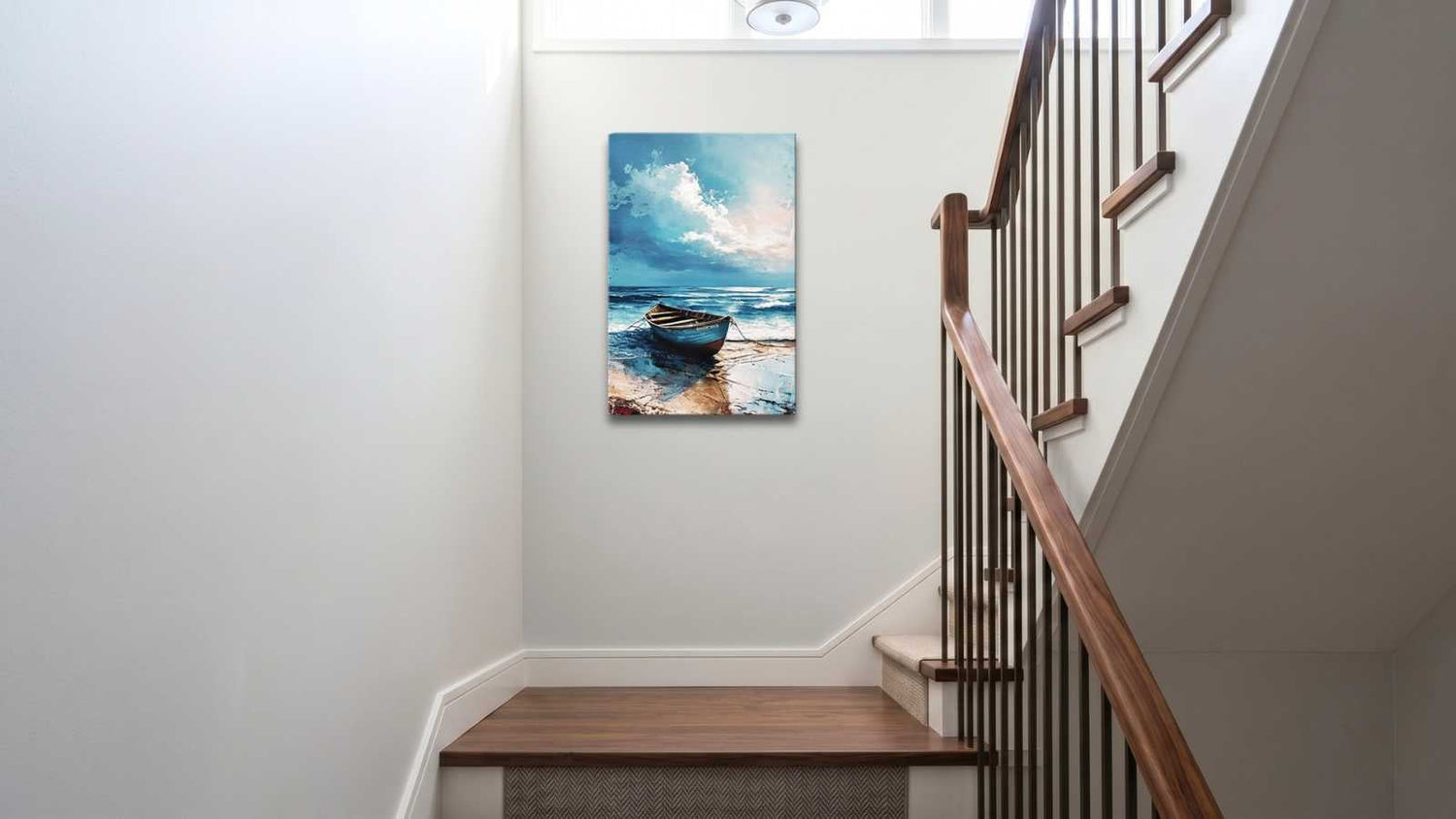 Coastal art for stairs hung at the stairway landing