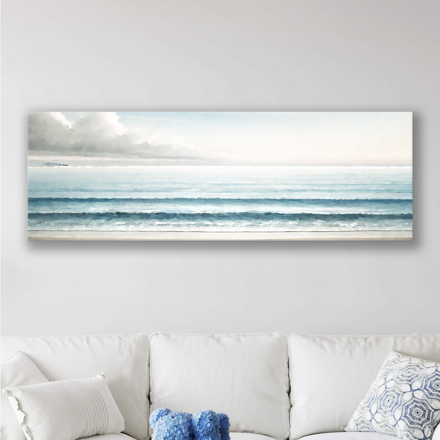 Blue horizon art canvas hanging in a living room