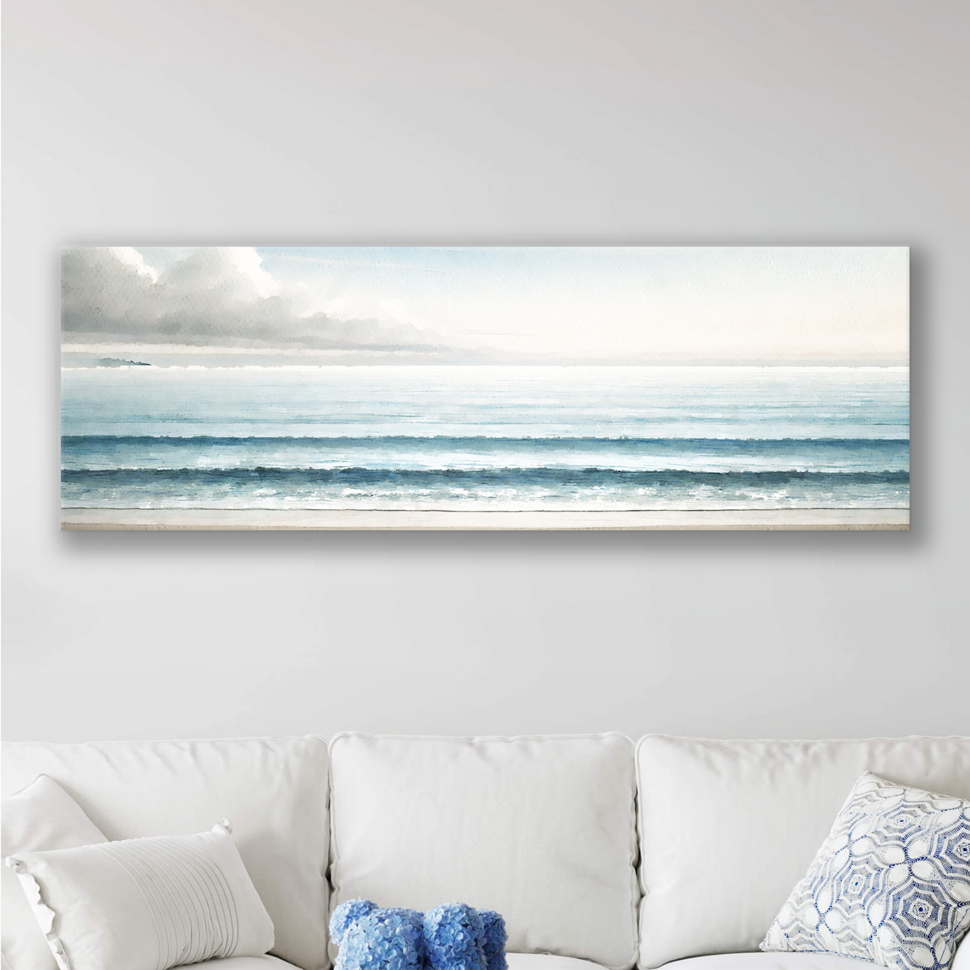 Blue horizon art canvas hanging in a living room