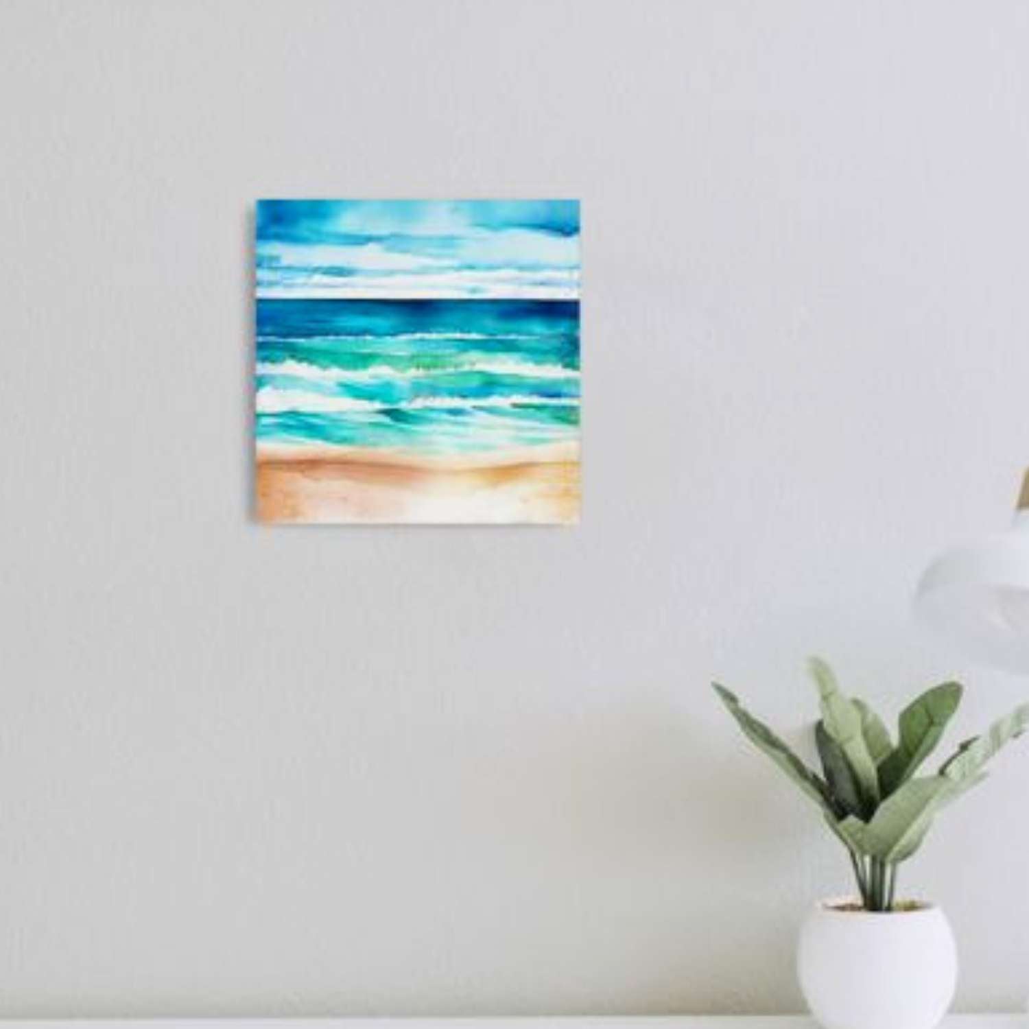 Blue ocean wall art canvas on a wall