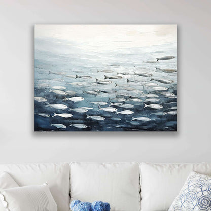 Fish wall art canvas hanging in a living room