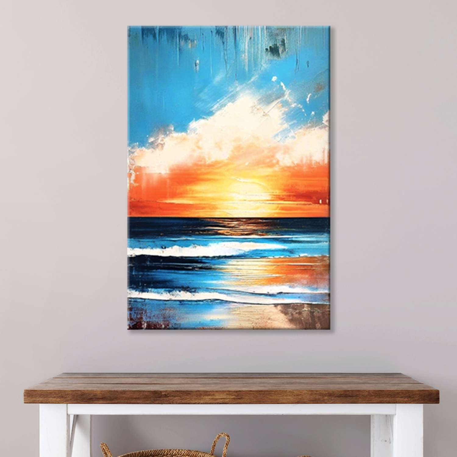 Ocean sunset wall art canvas hanging in a living room