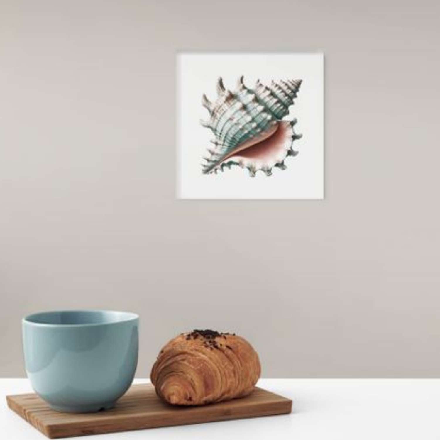 Sea shell wall art canvas hanging in a living room