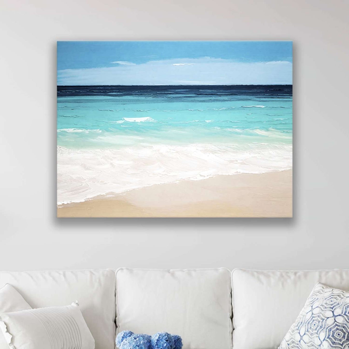 Seashore artwork canvas hanging in a living room