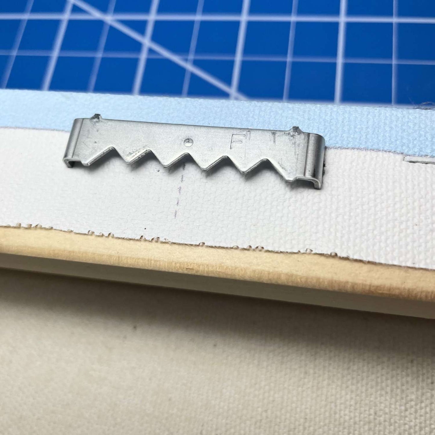 Mounting hardware on Waves Art canvas, ready to hang