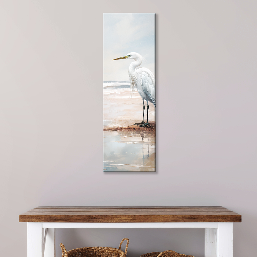 This heron bird painting hanging on a wall – premium thick coastal canvas.

