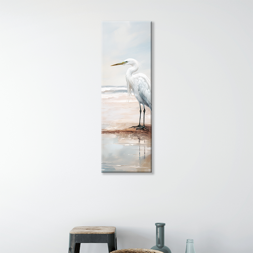 This egret art hanging on a wall, perfect for a beach-inspired space
