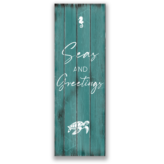 ocean-inspired Christmas canvas wall art SEAS AND GREETINGS. The Christmas canvas picture shows text saying "Seas and Greetings".
