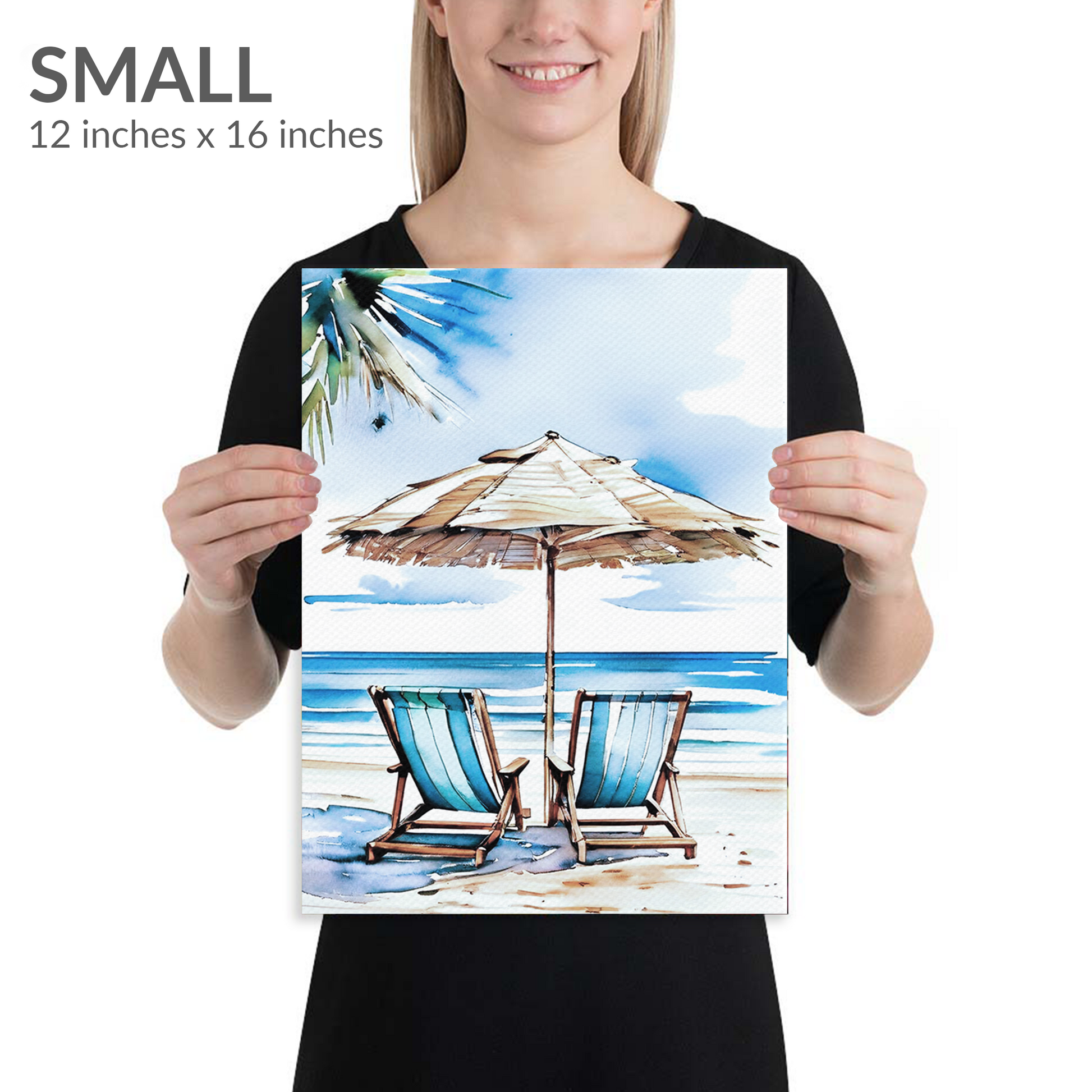 A woman holds the small size of beach canvas art ESCAPE. Gallery wrap canvas in portrait orientation. Text reads: “SMALL 12 inches x 16 inches”