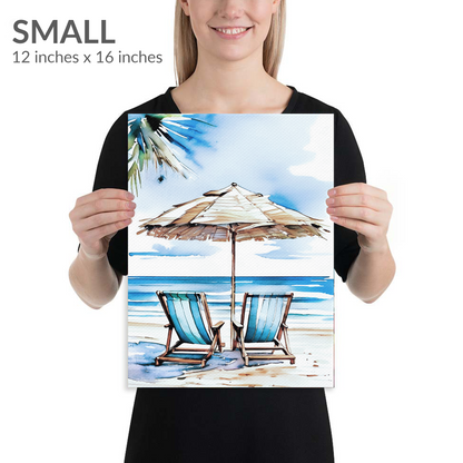 A woman holds the small size of beach canvas art ESCAPE. Gallery wrap canvas in portrait orientation. Text reads: “SMALL 12 inches x 16 inches”