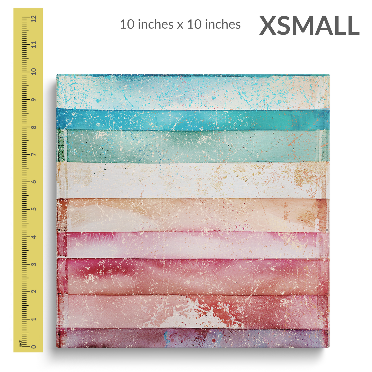 A 12 inch ruler is next to the extra small size of beach wall art on canvas TROPICAL VIBES. Gallery wrap canvas is square. Text reads: “X-SMALL 10 inches x 10 inches”