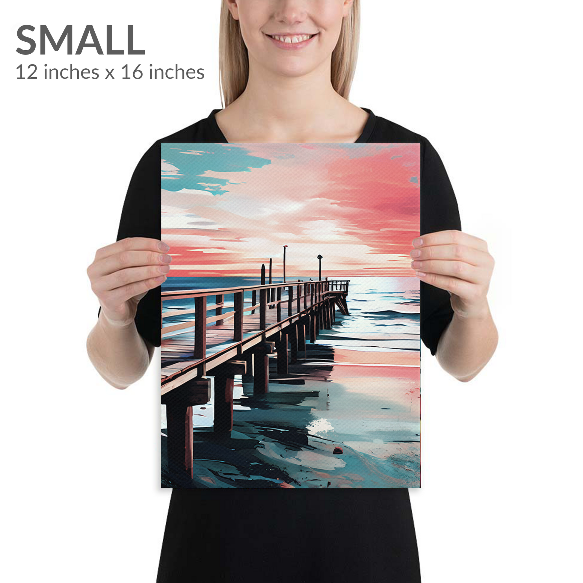 A woman holds the small size of coastal canvas art DISTANCE. Gallery wrap canvas in portrait orientation. Text reads: “SMALL 12 inches x 16 inches”