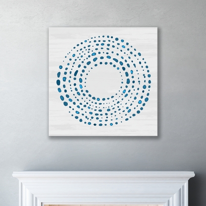 The ocean art canvas DROPLETS. The piece hangs on a wall.
