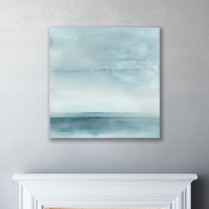 The ocean art canvas BLUESCAPE. The piece hangs on a wall.
