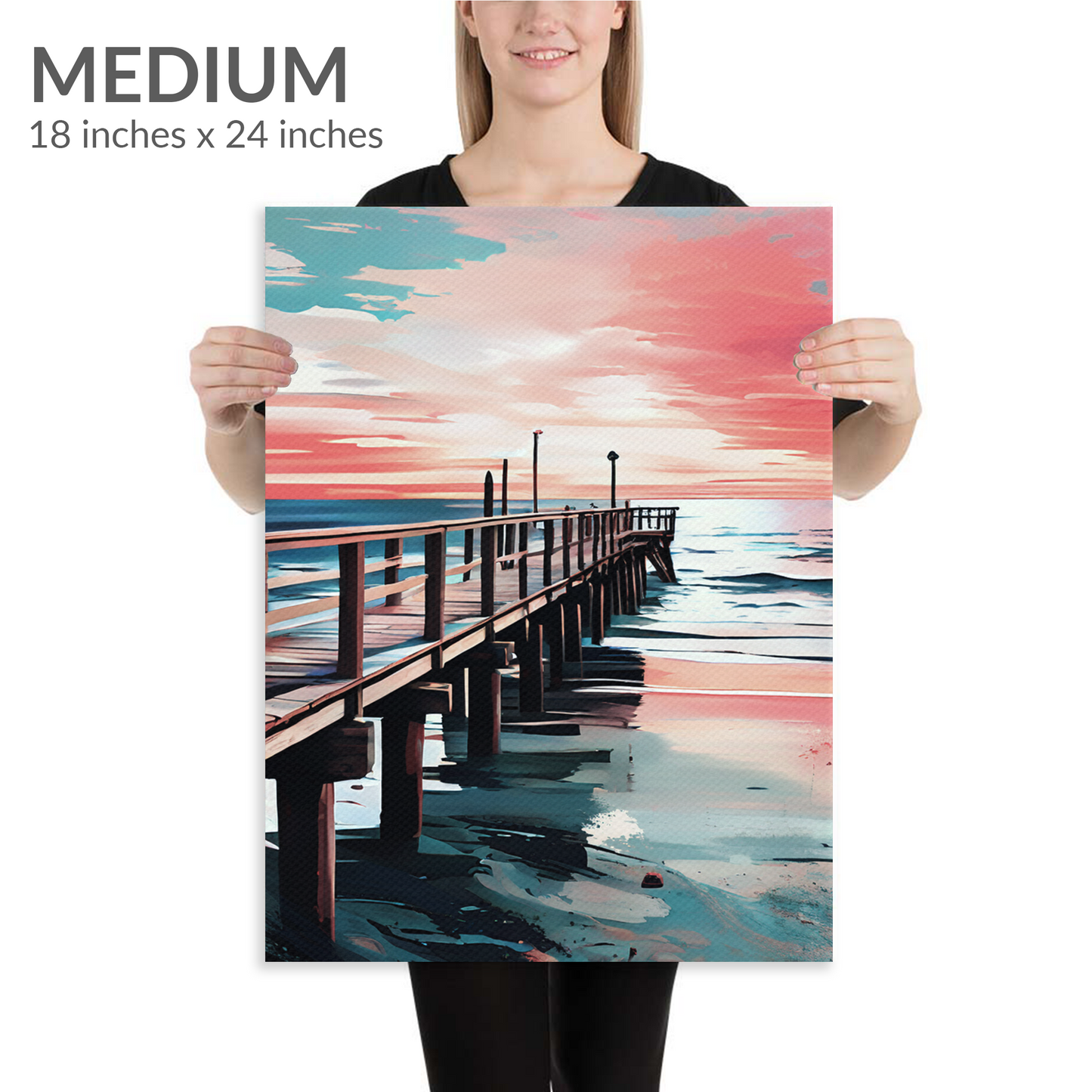 A woman holds the medium size of coastal canvas art DISTANCE. The beach art is in portrait orientation. Text reads: “Medium 18 inches x 24 inches”