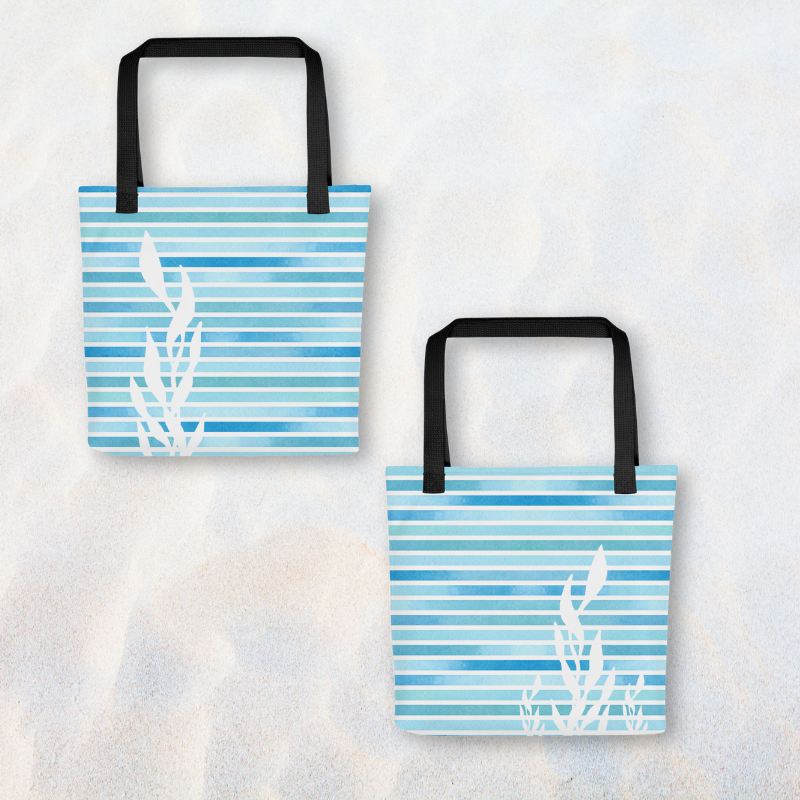 Women tote bag shown front and back on sand, featuring striped kelp design and roomy 15” x 15” size.

