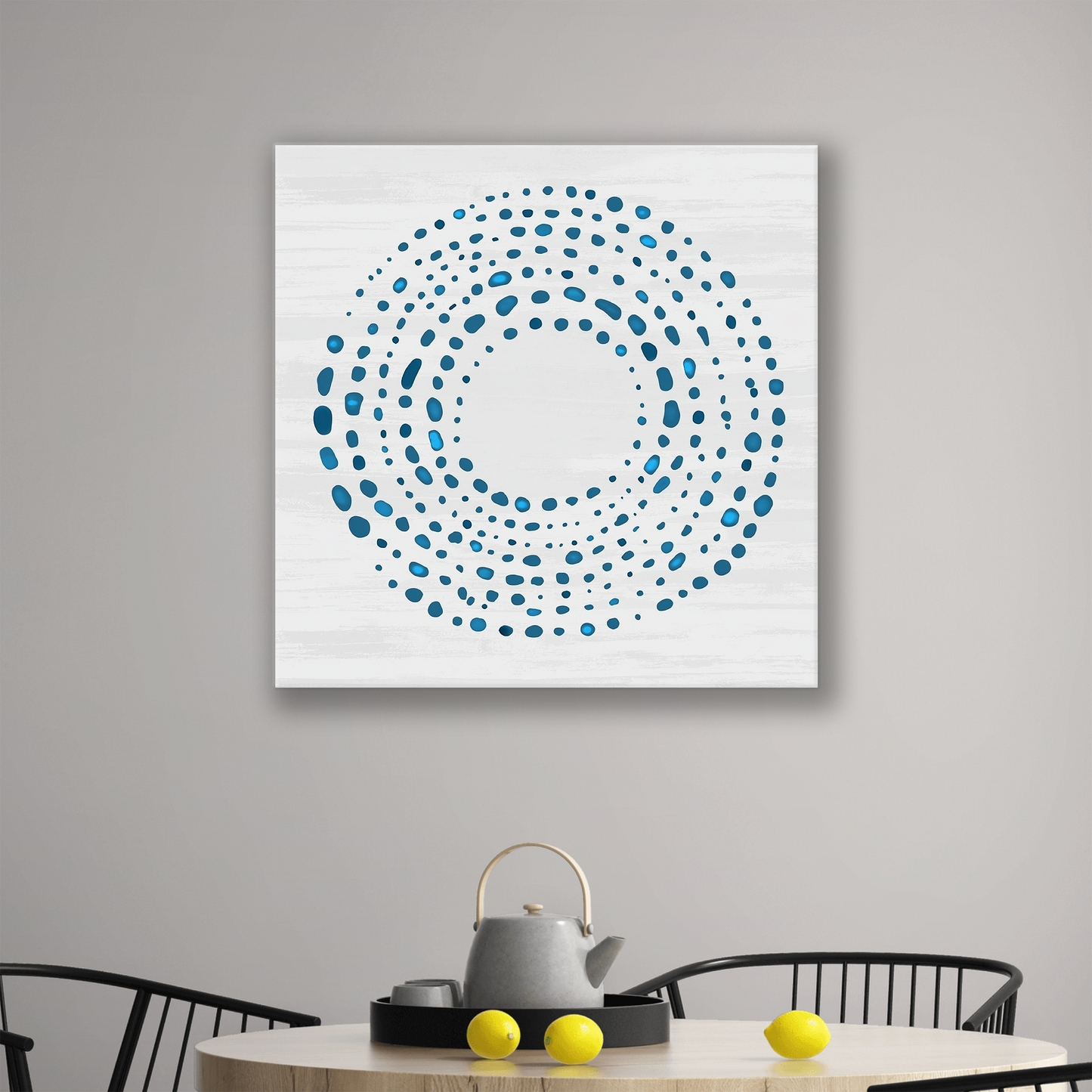 The ocean inspired artwork DROPLETS. The piece hangs on a wall.
