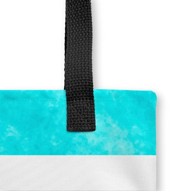 Close-up of sturdy black strap and seam stitching on the boat tote, highlighting its durable hand-sewn construction.