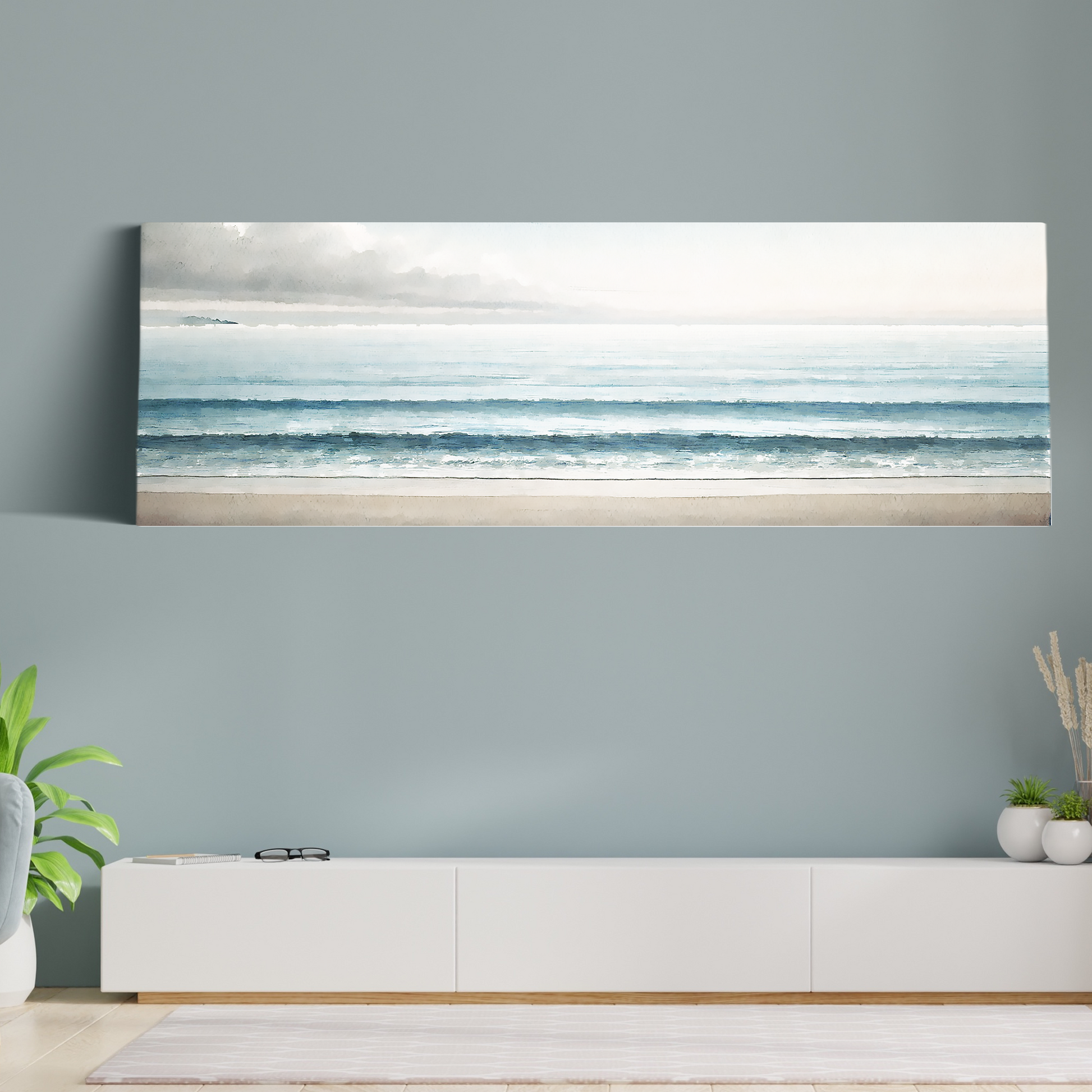 ocean canvas BEYOND THE BLUE hanging on a wall.
