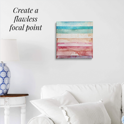 beach wall art on canvas TROPICAL VIBES hanging over a white couch. Text reads: “Create a flawless focal point.”