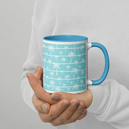 lady's hands are holding the beach coffee mug