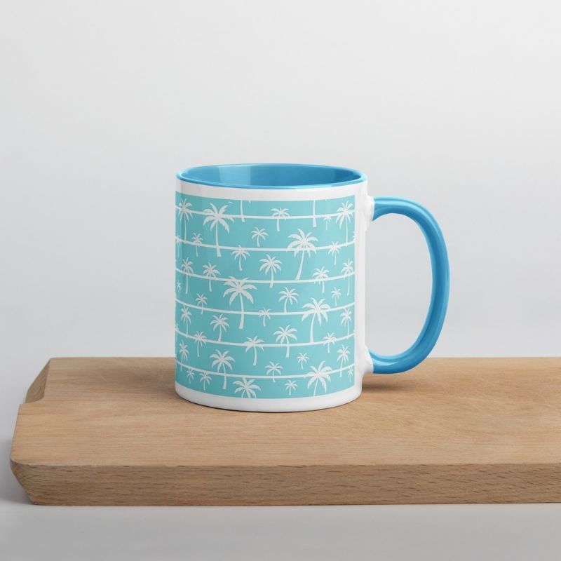 beach mug on a tray, handle showing on the right