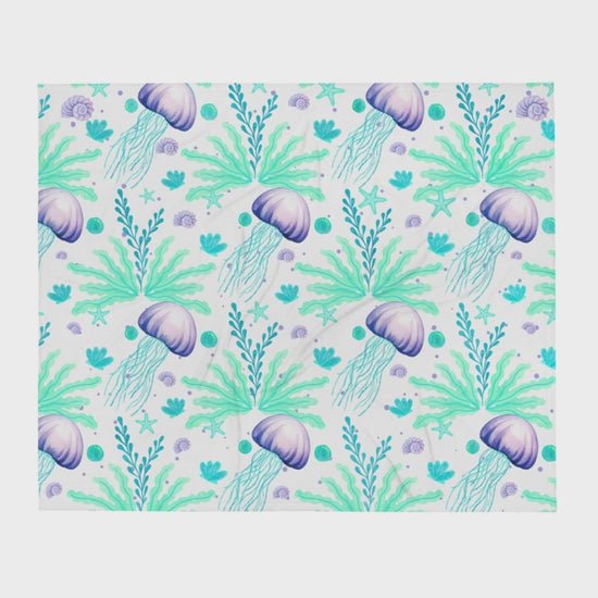 Video of Jelly Drift Aqua & Lavender Throw Blanket — beach throw blanket with aqua and lavender jellyfish design
