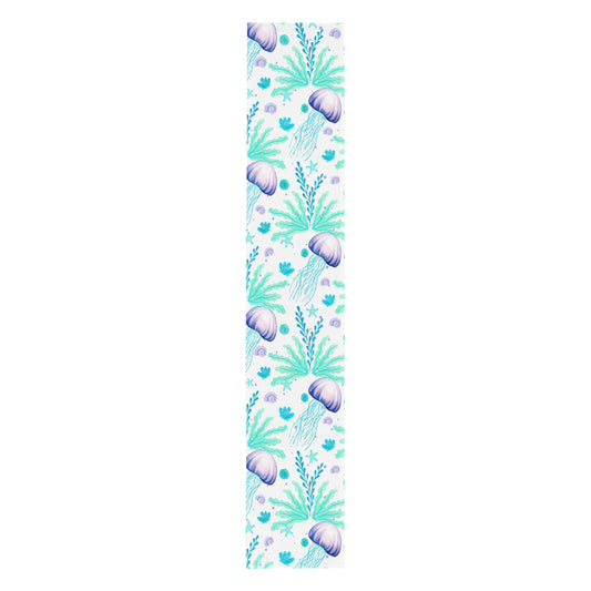 table runner with jellyfish and seaweed pattern on a white background